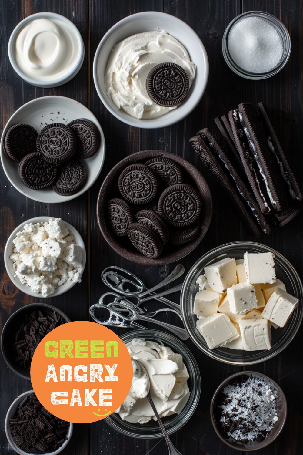 Top-down view of the ingredients for Oreo cheesecake bars including Oreos, butter, cream cheese, heavy cream, vanilla, and sugar, laid out on a dark wooden surface