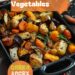 A vibrant photo showing a roasting dish filled with a variety of perfectly roasted vegetables, including butternut squash, parsnips, carrots, and aubergines, garnished with herbs. The background is a dark, black wooden texture surface. This image demonstrates vegetable roasting techniques.