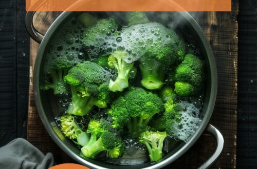 A vibrant photo showing perfectly cooked broccoli florets in a serving bowl, garnished with a sprinkle of salt and pepper. The background is a dark, black wooden texture surface. This image demonstrates broccoli preparation techniques.