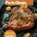 A vibrant photo showing a frying pan with a perfectly cooked pork chop, golden brown and juicy, with a clove of garlic and some herbs in the pan. The background is a dark, black wooden texture surface. This image demonstrates pork chop cooking techniques.